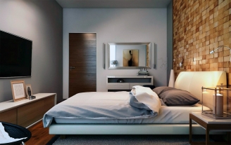 Размещение телевизора на стене в спальне напротив изголовья кровати